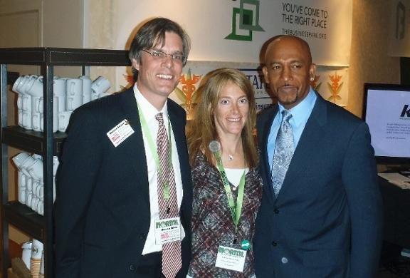 Partners Warren Edson and Lauren Maytin with Montel Williams