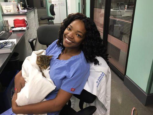 Dr. Mari-Ashli Foy comforts her patient after a leg amputation