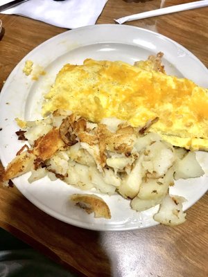 This is a delicious cheese omelet with a side of potatoes. VERY GOOD FOOD!!!