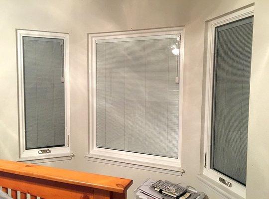 Top-of-the-line Vanguard casement windows with blinds in between the panes of glass.