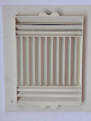 This vent is still dusty after their 'cleaning' on the outside, which involved running the most impotent suction over it.