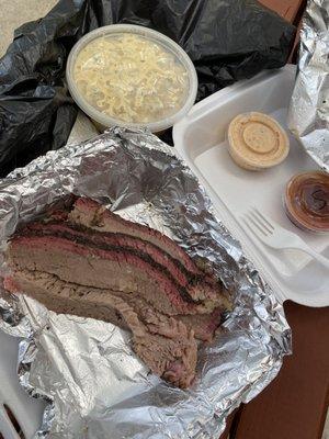 1/2 lb brisket, medium mac and cheese, brothers q bbq sauce and not sure about the other one.