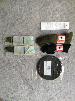 Three pairs of green socks ($6.51), three pairs of black socks ($1.98), one 7 3/4'' black beret ($12.95), insoles ($1.69 each)