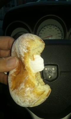 First Doughnut, big bite, no cream, had to squeeze to see if there was any cream in it