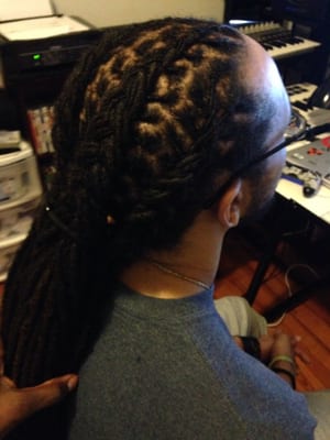 Locks re-twist and braided by Jami'a/Kauthari's Visions of style! www.kautharisvisions.com