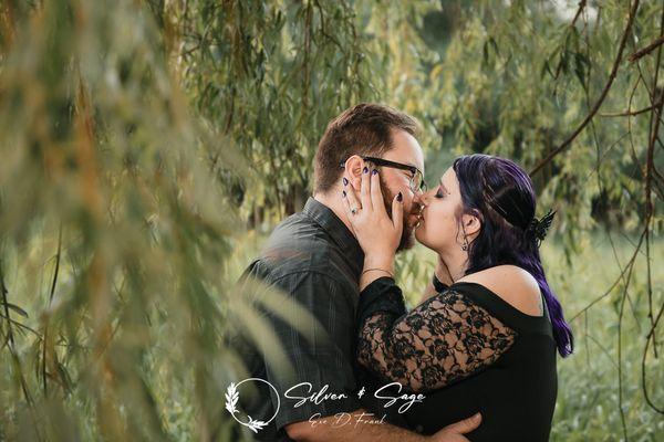 engagement photos under a weeping willow tree