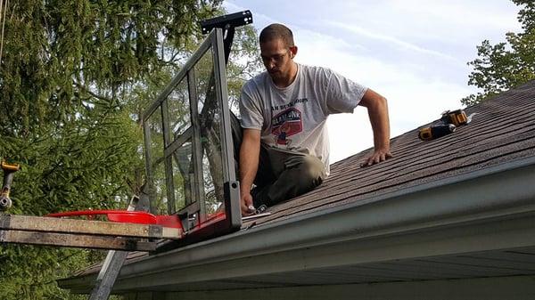 Tony securing 48" Lifetime Roof Mount Orland Park, IL