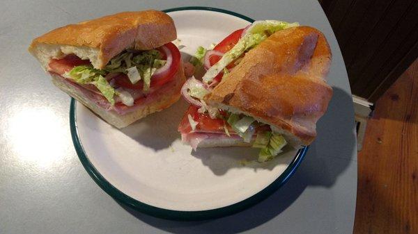 An eight inch Italian hoagie on a fresh baked bun