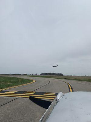 Bonanza landing on runway 33