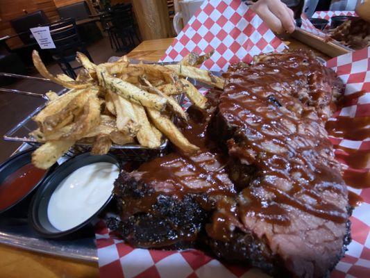 I think this was called the brisket. It melts in your mouth. The fries were perfectly seasoned and fried.