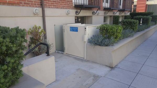 Wheelchair lift with street access