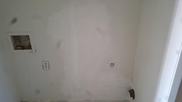 Poorly repaired dry wall.