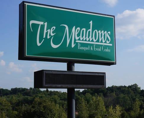 outdoor sign for The Meadows