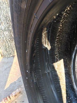 These are the type of "like new" tires they sell. Avoid this place!!