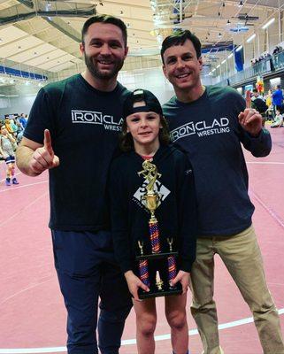 Coach Matt Harbison with his son Rivers, Coach Jake  and our team's State Championship trophy