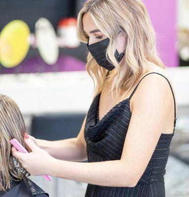 our staff working to create your hair goals