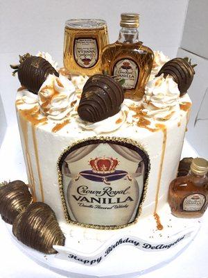 Crown royal Vanilla cake with caramel drip and chocolate dipped strawberries ‍