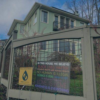 Eastgate home with yard sign out front. Water is life. We help you realize this statement.