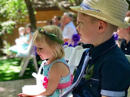 Lovely little head wreaths for the kids..and lavender/rosemary boutonnière for the guys..young and old!