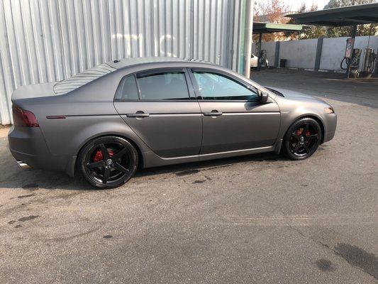 UPGRADED STOCK WHEELS TO  G-LINE WHEELS AND PAINTED CALIPERS GLOSS RED RED, and lowered the Acura TL WITH TruHart Coilovers