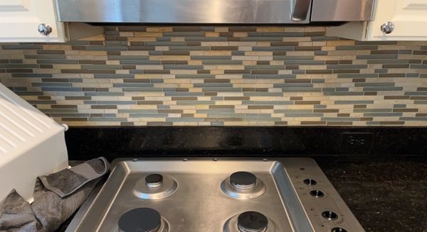 Cleaned & scrubbed stove & backsplash.