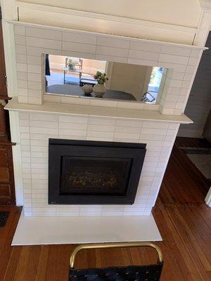 here is a tile fireplace done by GOT TOOLS HANDYMAN