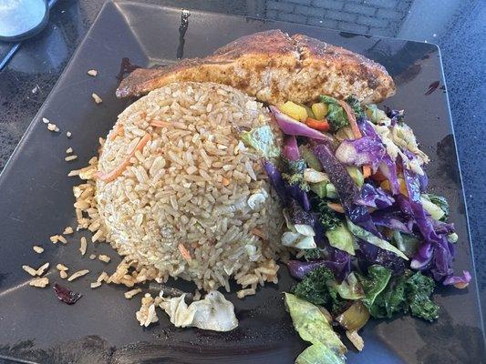 Jerk Salmon with fried rice and kale/cabbage