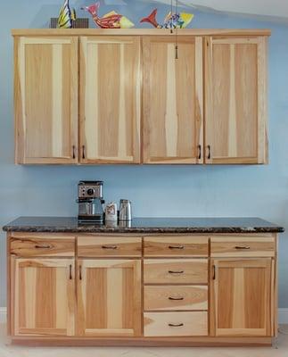 Hickory banquet and storage cabinets.