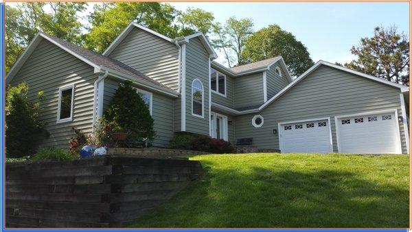 Woodridge-Ivy Green-Vinyl Siding-White-Trim-Gutters-Pella Windows