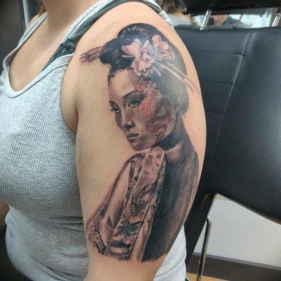 Geisha tattoo by artist/owner Mark Strong.