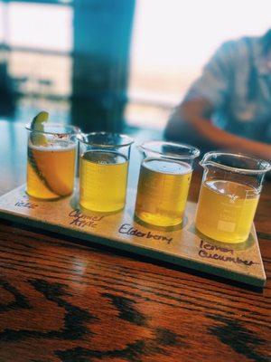 Beer flight available in the Sour house. (Left to right) pickle, caramel apple, elderberry, and lemon cucumber. Lemon cucumber was my fav!