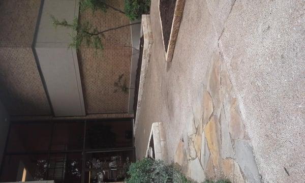 Client needed to control foot traffic across the beds, Likewise; lower left corner flag stone work was part of bed traffic pr...