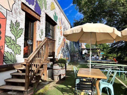 Outside seating in back of building next to BeltLine trail.