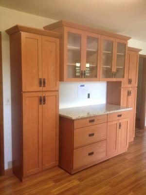 New cabinets with roll out island. also installed new Pergo flooring