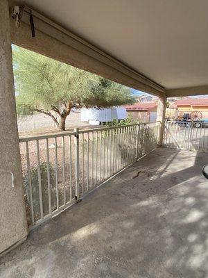 Closed off this patio with wrought iron and a gate