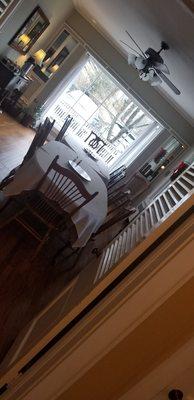 Common dining room with a large bright and warm bay window.