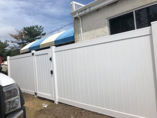 White vinyl fence