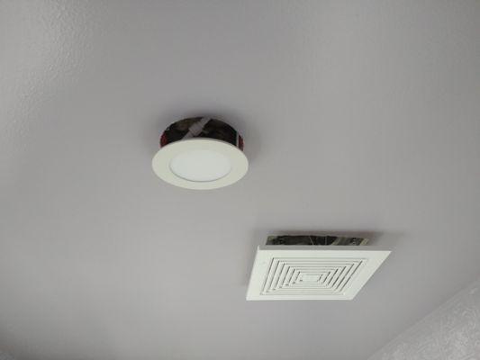 Added recessed lighting and fan in bathroom!