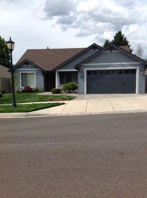 Newly painted house - in three shades of gray.