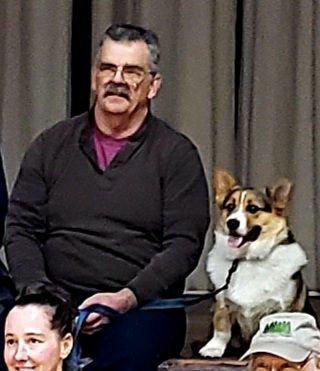 Husband and puppo Merlyn at Canine FUNdamentals (clicker training) getting Merlyn's diploma.