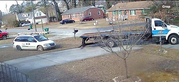 Stupid person being towed out of my yard..