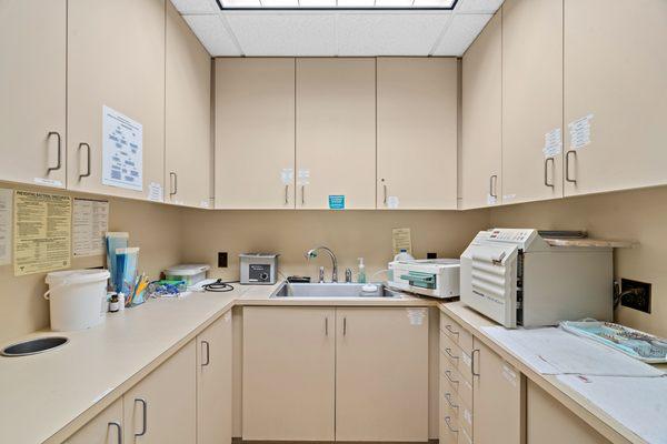 The sterilization room, specially equipped to sterilize and discard instruments