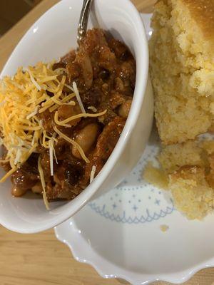 4 Bean Chili with Shredded Cheese and side of Cornbread.