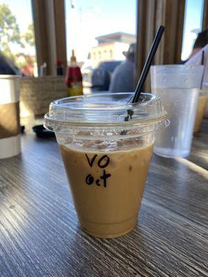 Vanilla orange iced latte with oat milk