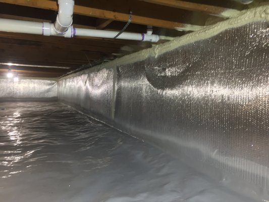 Insulation that also works as a vapor barrier is sealed by Nu-Crawl  high performance polymer coating