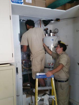 Dorian & Alan installing Trane XV95 furnace.