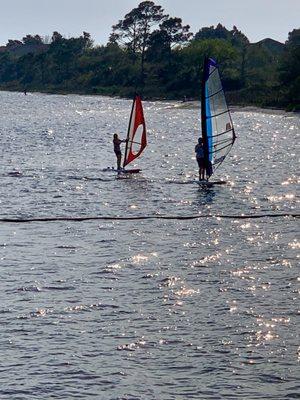 Windsurfing is fun for the whole family.