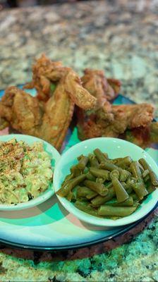 Fried wings , macaroni salad and string beans