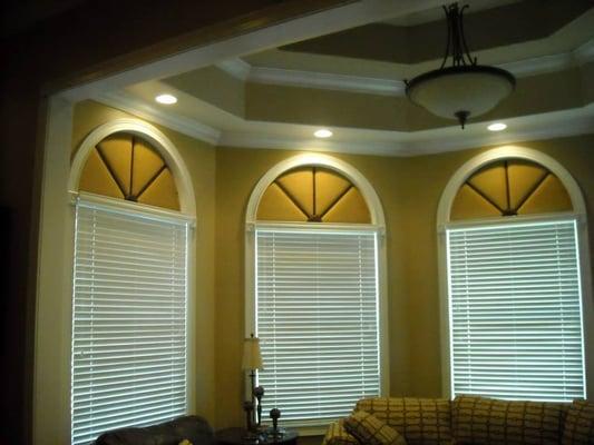 Half circle cornices with leather accents