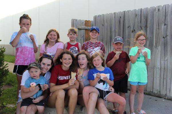 Hanging with the squad enjoying their favorite ice cream on a hot summers day!